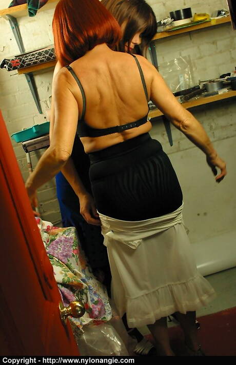 Stocking Videos photo collection featuring Nylon Angie in soft lesbian action