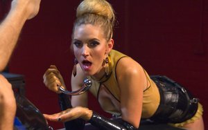Divine Bitches invites you to browse their free photos with Mona Wales and Tony Orlando in bizarre bdsm action